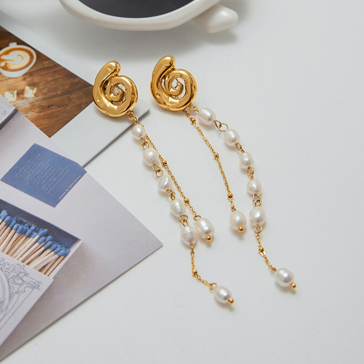 18K gold conch-shaped earrings with pearl tassels, exquisite and noble design