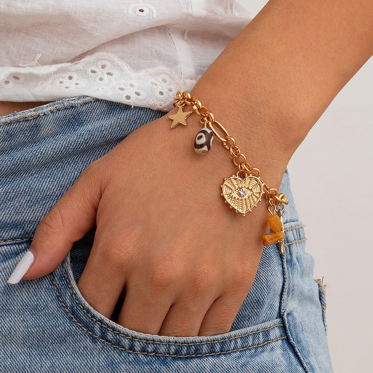 Retro elephant bull head personality niche peach heart imitation pearl shell bracelet