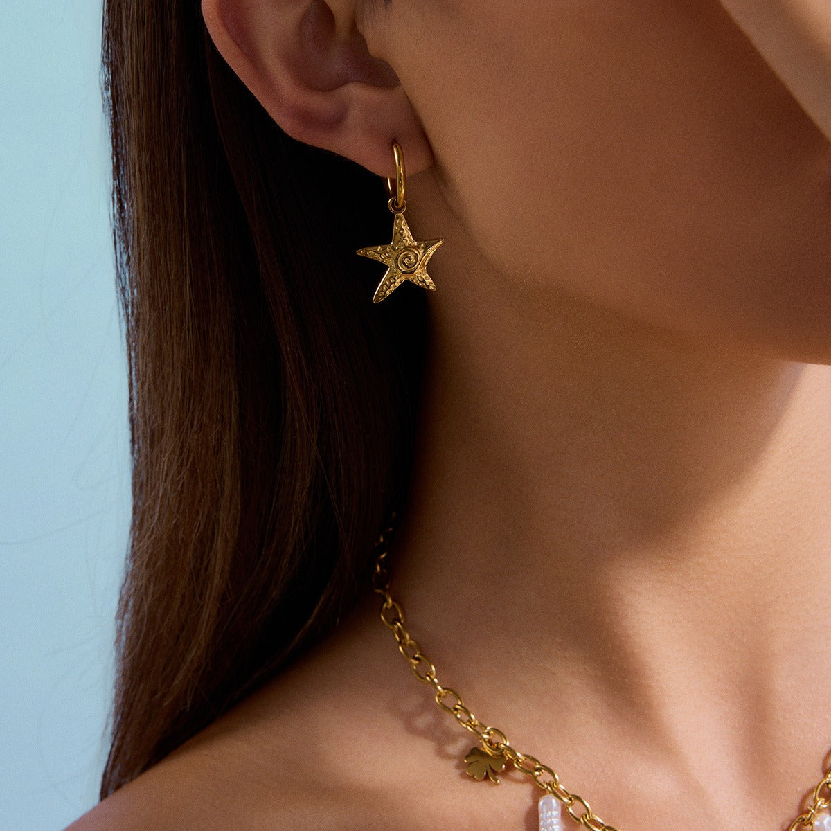 18K gold starfish with conch design exquisite ocean-style earrings