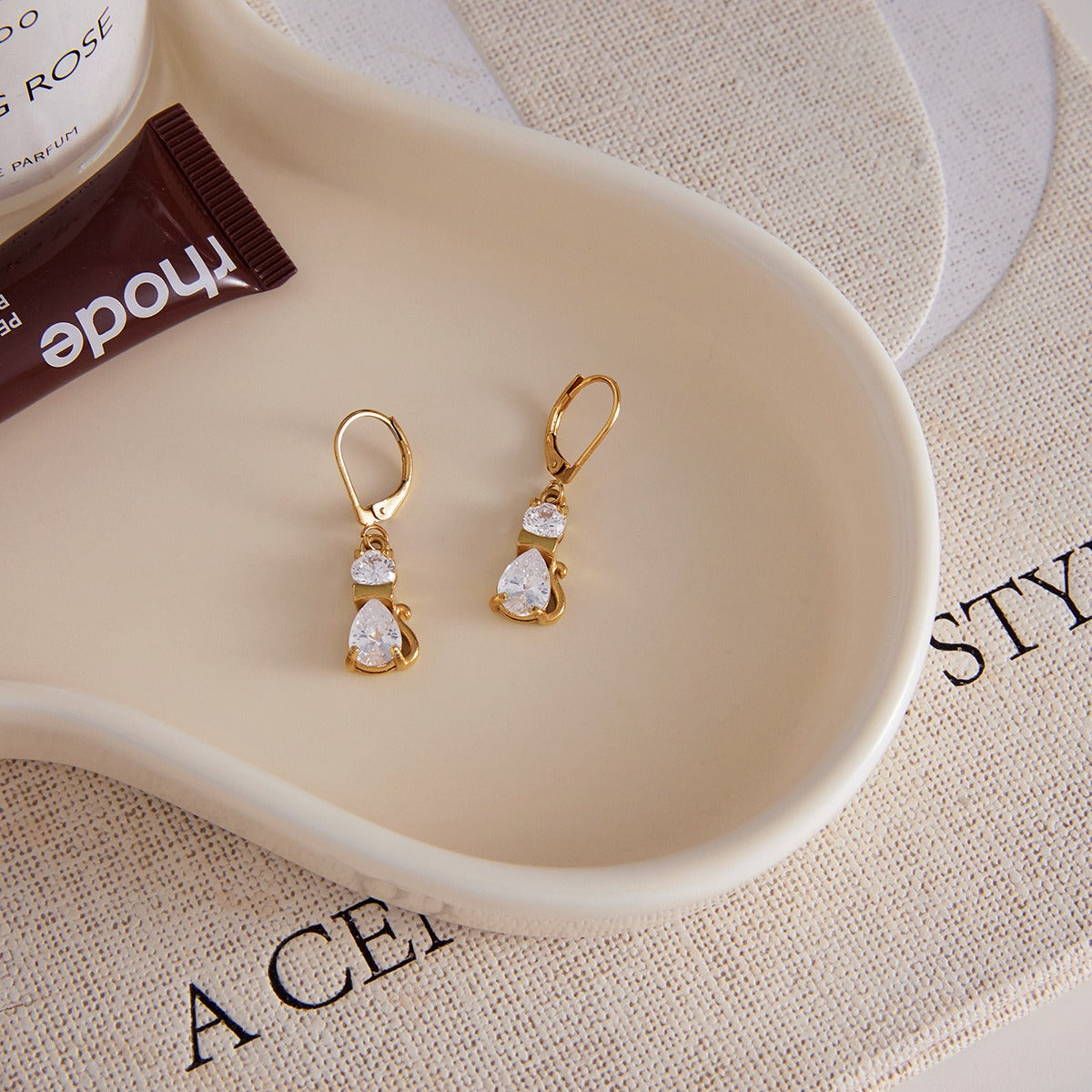 18K gold plated, lightweight and luxurious cat-shaped earrings with zircon stones.