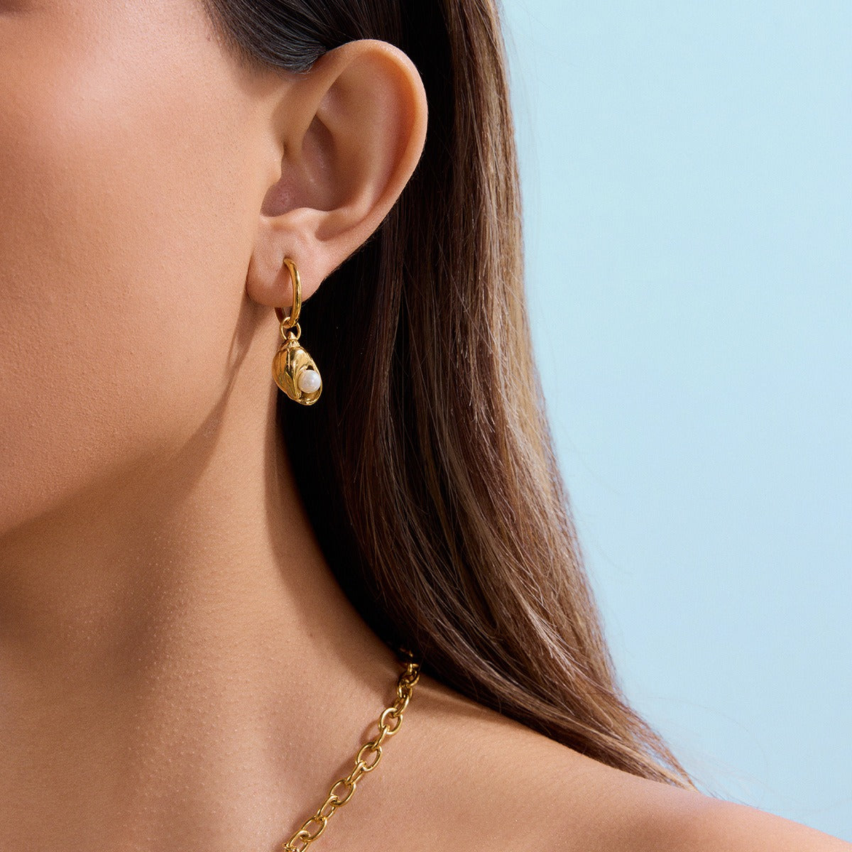 18K gold starfish with conch design exquisite ocean-style earrings