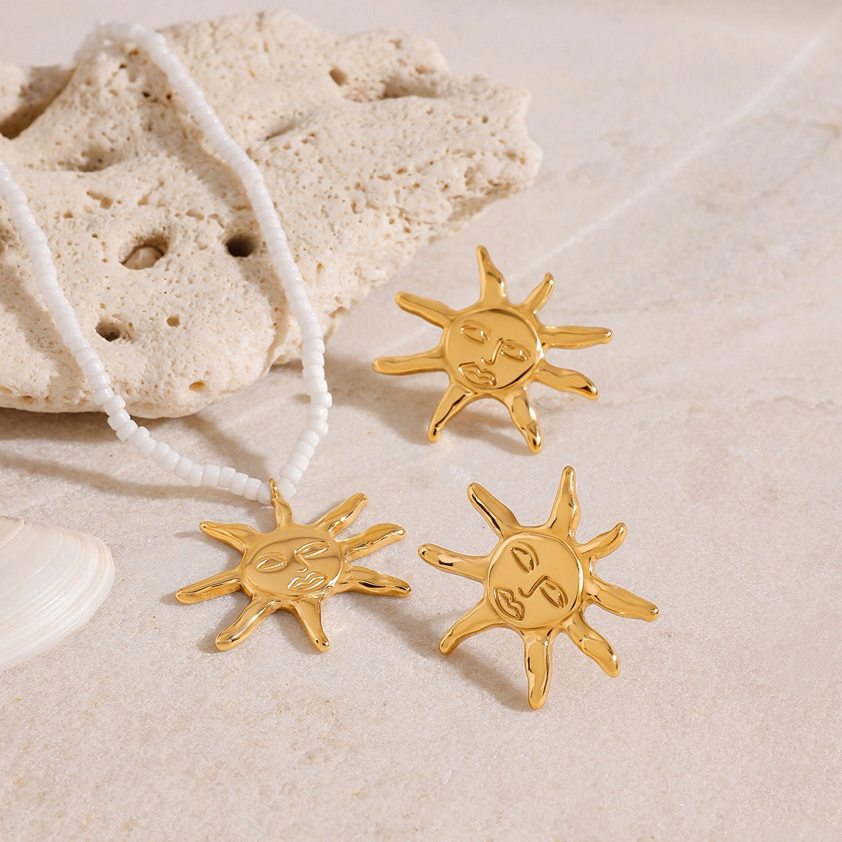 18K gold sun-shaped earrings and necklace set with exaggerated facial features