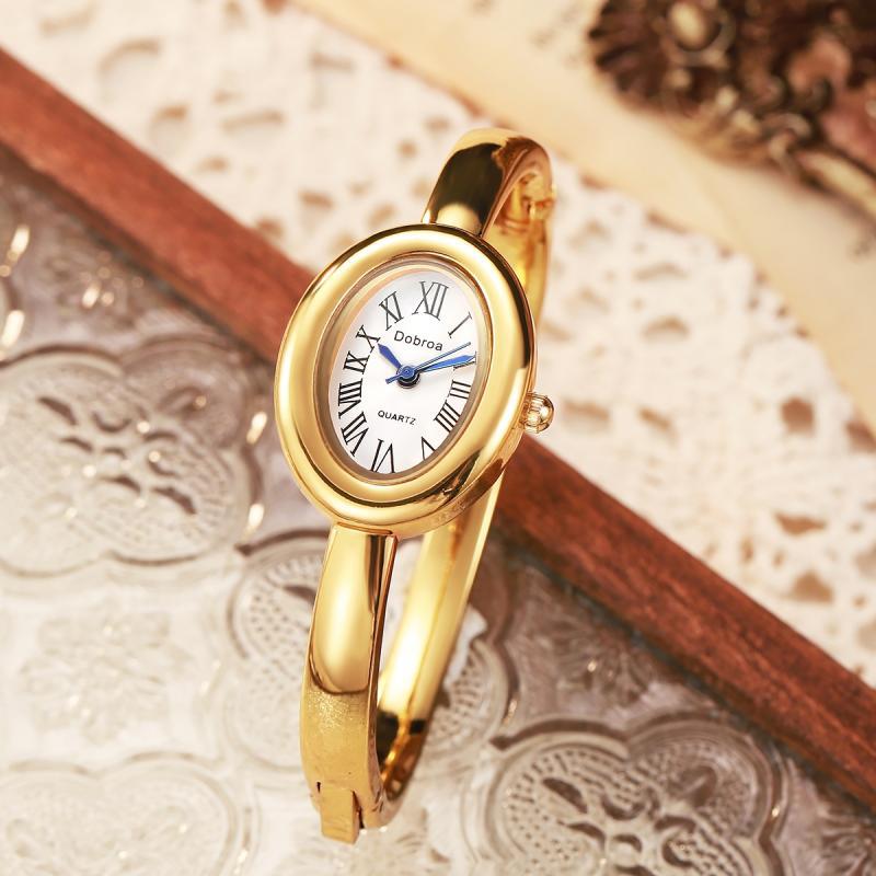 Light-luxury Niche Oval Womens Watch With A Rose Gold Diamond Bezel