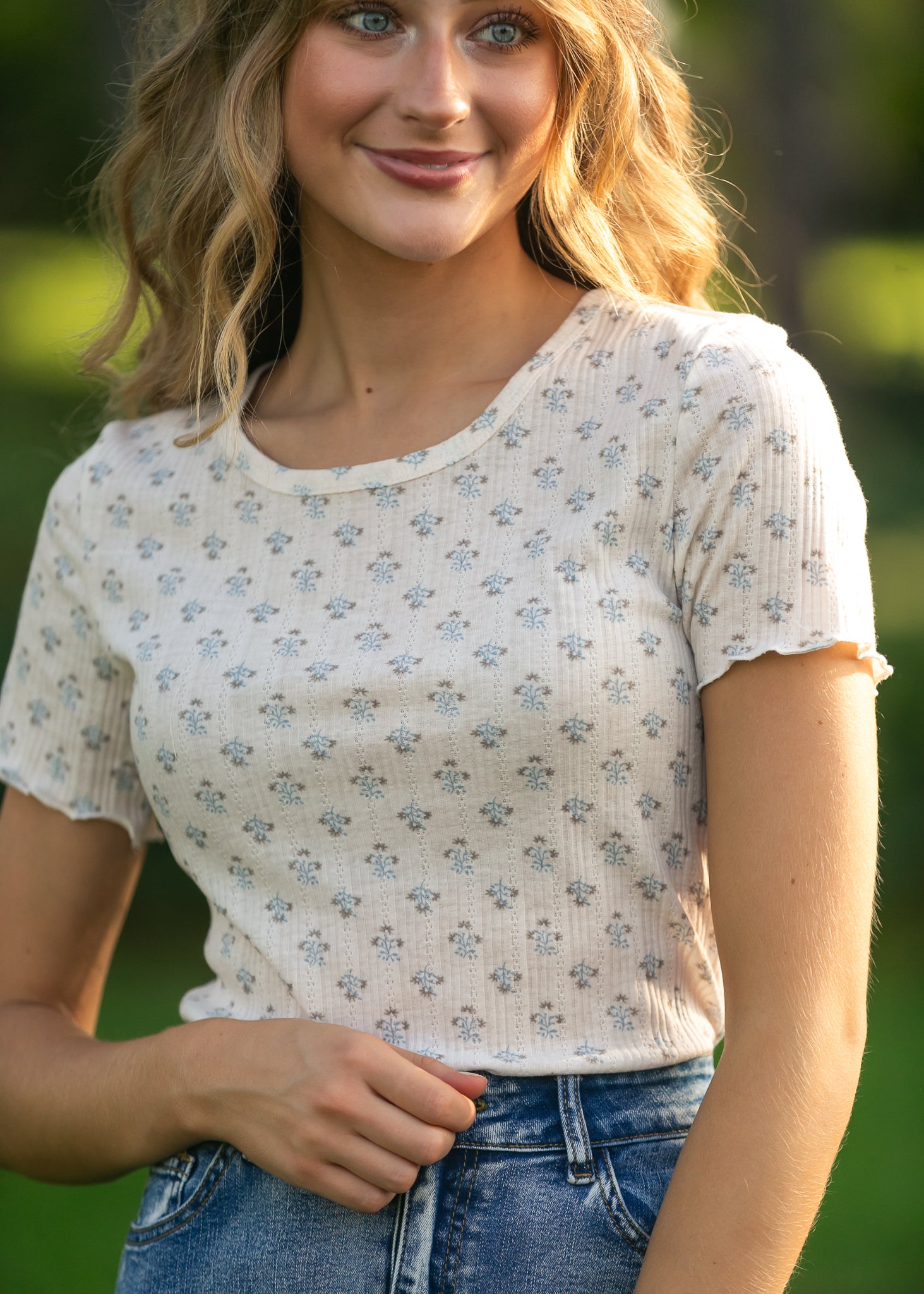 Larza Blue Floral Lettuce Hem Top