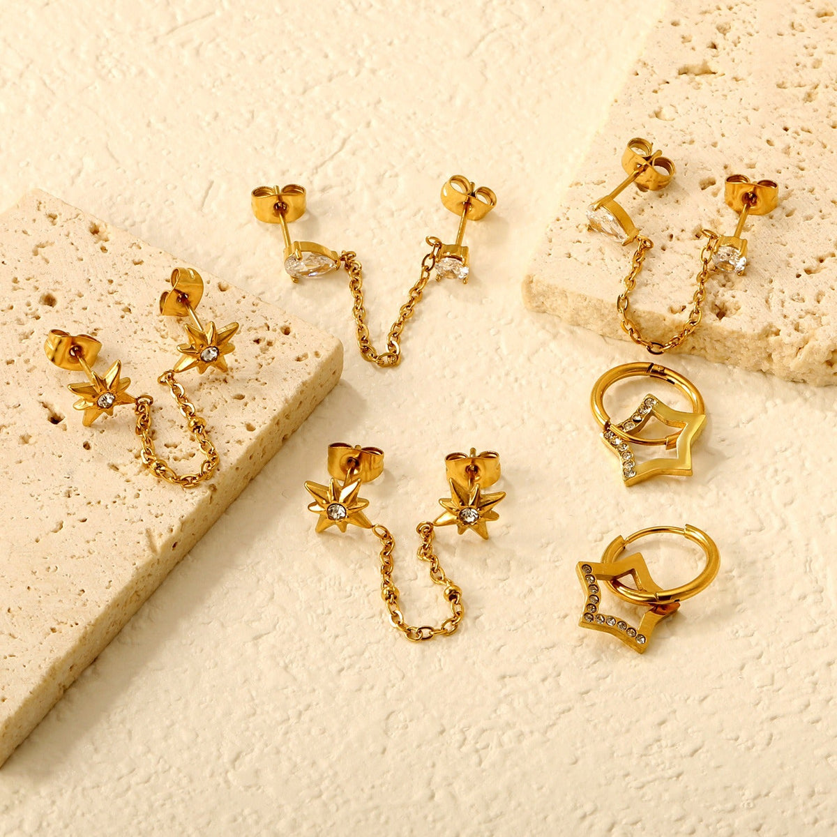 18K gold hollow star-shaped inlaid gemstones with exquisite design and dazzling earrings