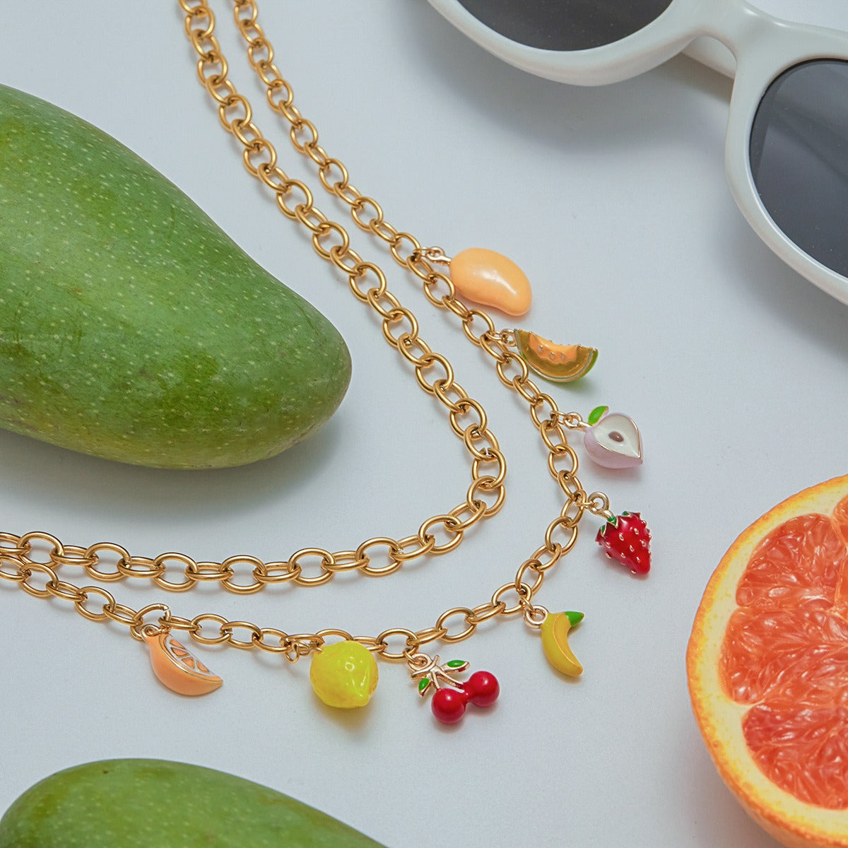 18K gold thick chain with fruit-shaped pendant design trendy and unique necklace, bracelet and earrings set