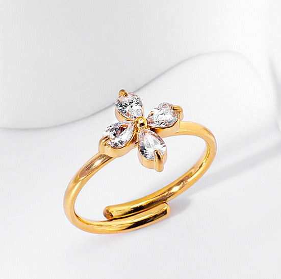 18K gold four-leaf flower inlaid with gemstones, exquisite and dazzling necklace, bracelet, earrings and ring set