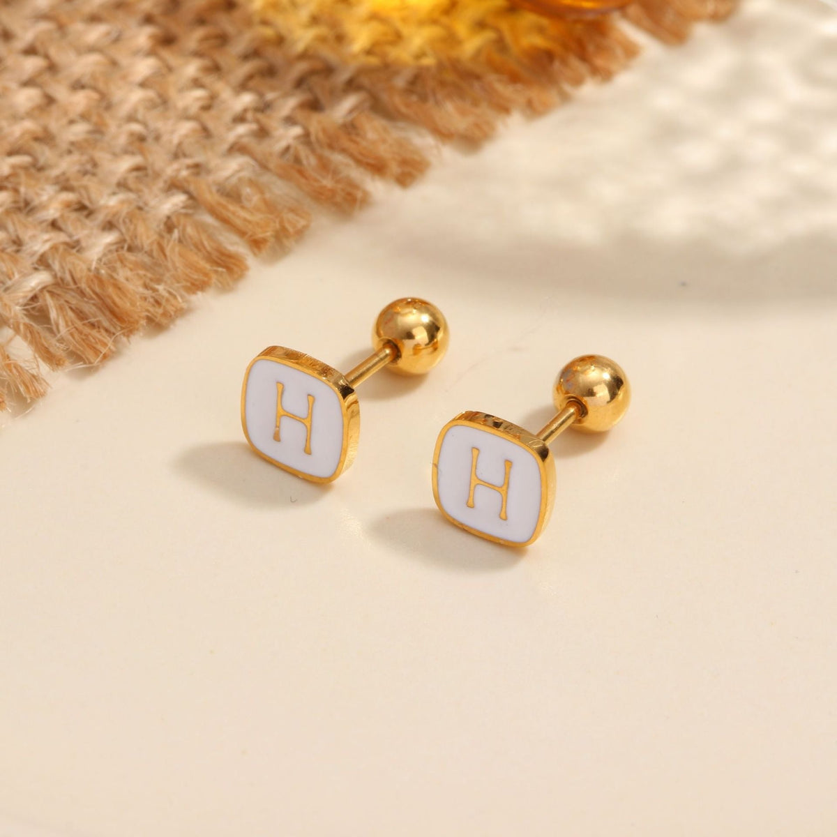 18K gold geometric inlaid gemstone design high-end earrings