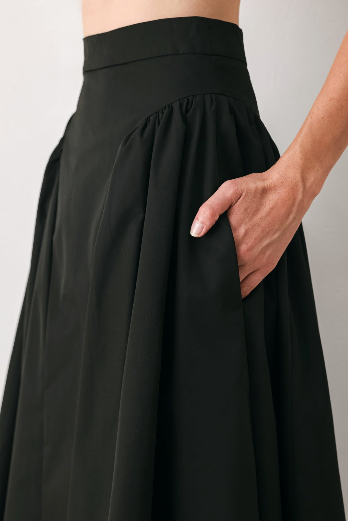 SCULPTED NOIR SHIRRED MIDI SKIRT