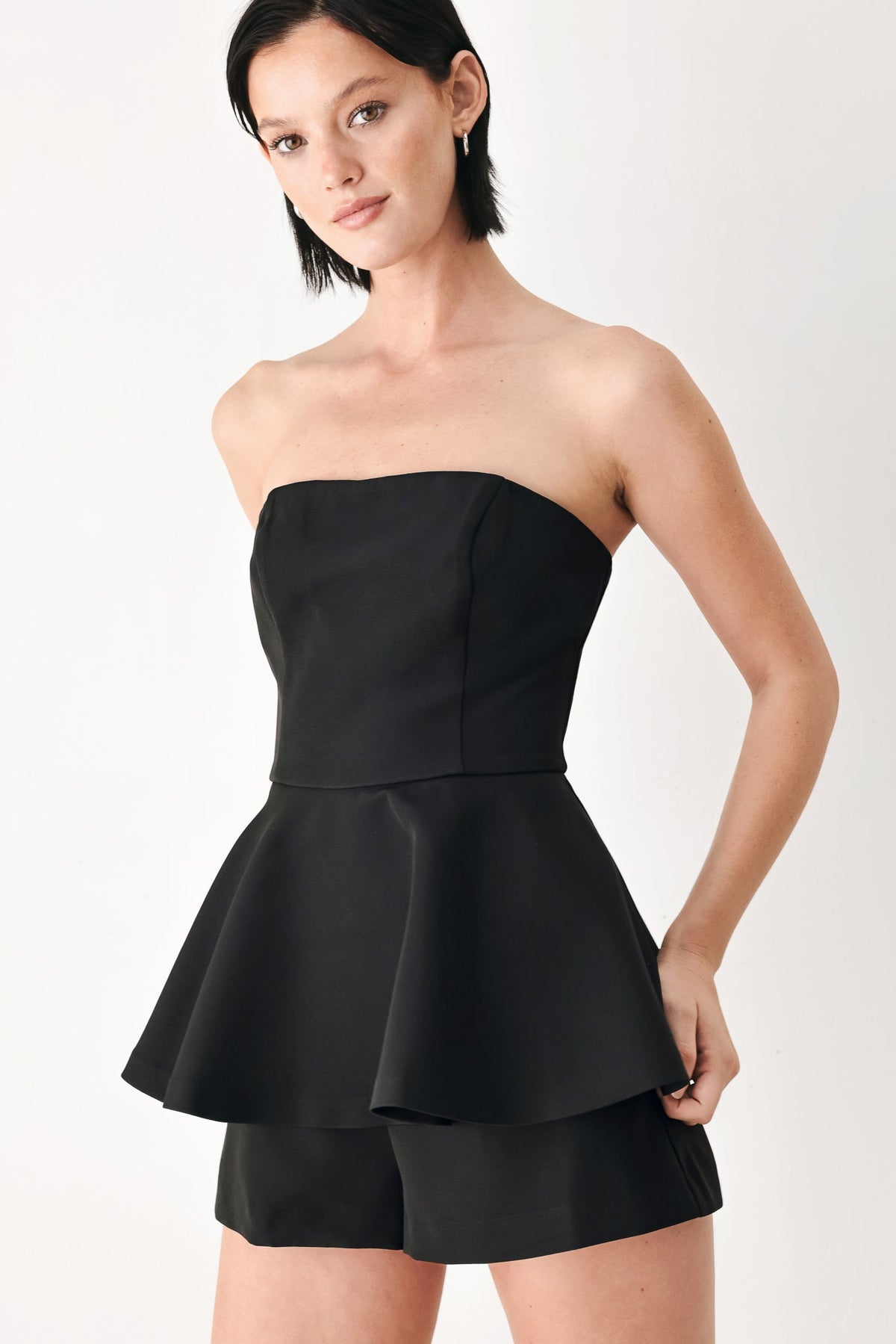 LITTLE BLACK MOMENT STRAPLESS PEPLUM ROMPER