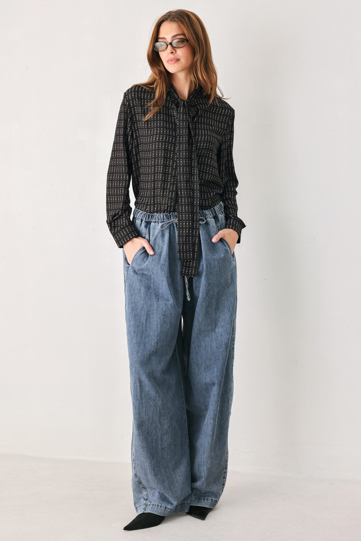 WHEREVER YOU MAY GO WOVEN TOP