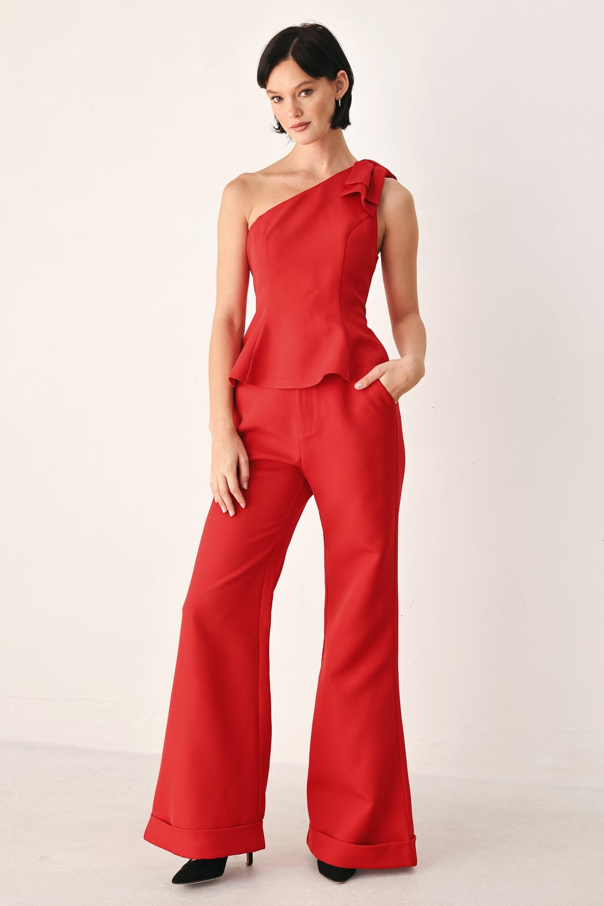 MAKE AN ENTRANCE ONE SHOULDER PEPLUM TOP