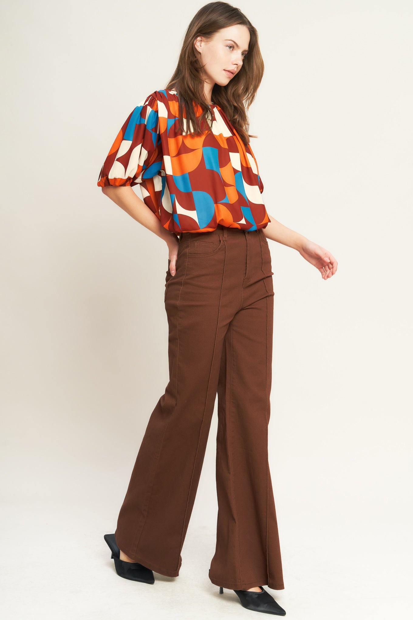 GONE IN A BLINK WOVEN TOP