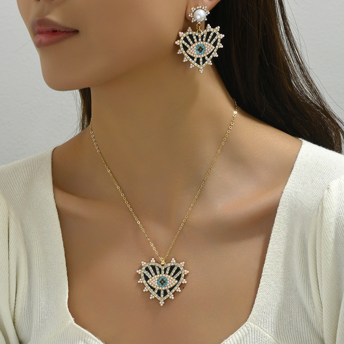 Cross-border Hot Hip-hop Retro Women's Necklace Earrings Niche Devil's Eye Diamond Design Earrings Long Chain