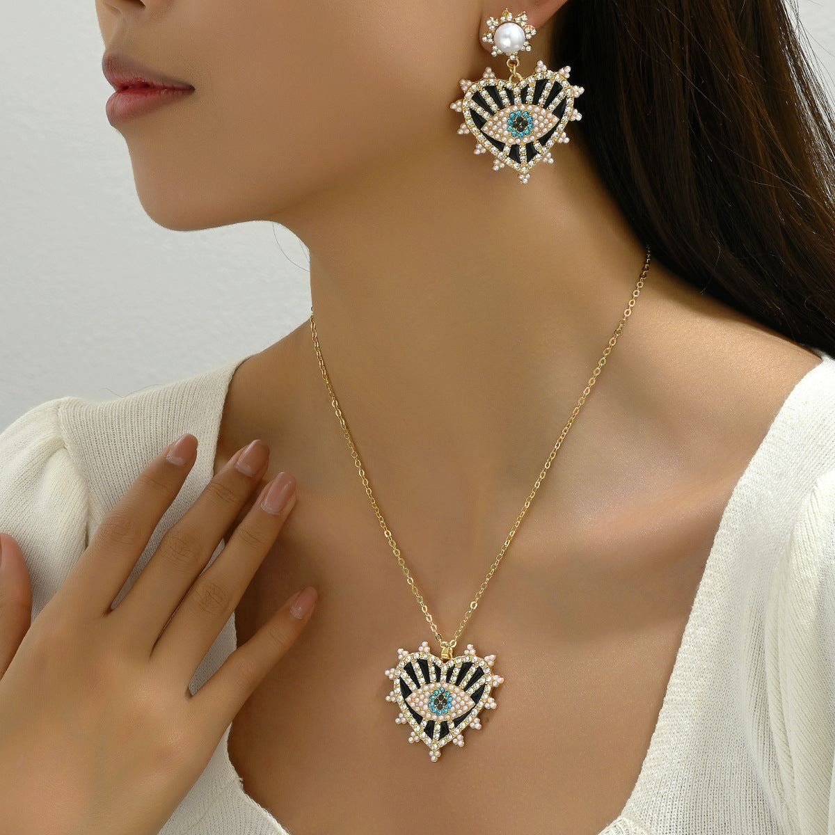 Cross-border Hot Hip-hop Retro Women's Necklace Earrings Niche Devil's Eye Diamond Design Earrings Long Chain