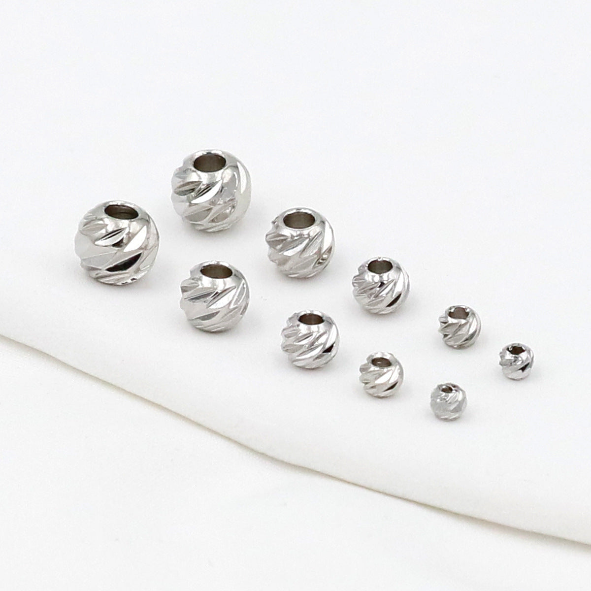 Copper-plated 18K Gold Beveled-cut Filigree Round Spacer Beads