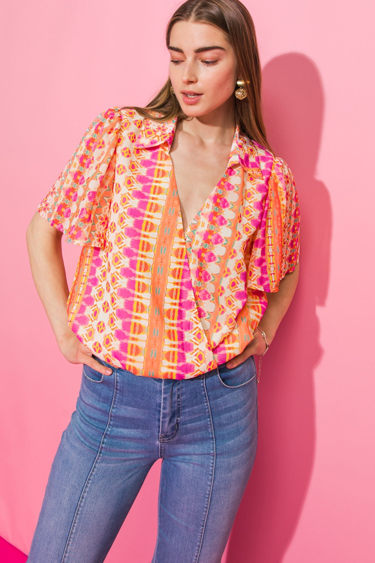 THE STORY CONTINUES WOVEN TOP